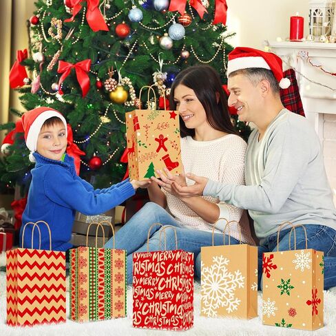 اكياس هدايا كرافت للكريسماس من لايون، 24 قطعة - شنطة هدايا ورقية للعطلات - حقائب هدايا الكريسماس بمقابض - حقائب هدايا حفلات الفصول الدراسية مع مطبوعات متنوعة in Kuwait