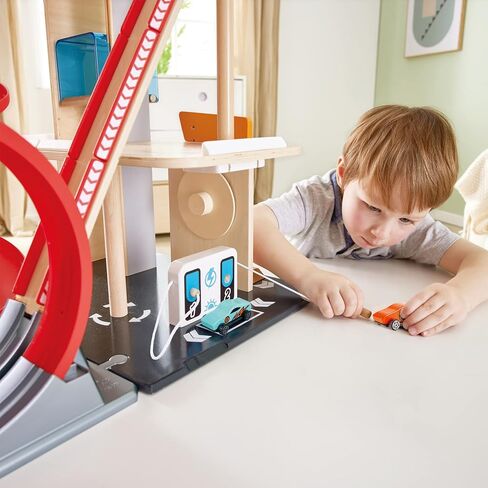 Hape Gearhead Stunt Garage Kids Wooden Toy Car Parking Garage Playset w/Elevator and 2 Exit Tracks, Detachable Loop, Includes 2 Wooden Toy Racecars in Saudi Arabia