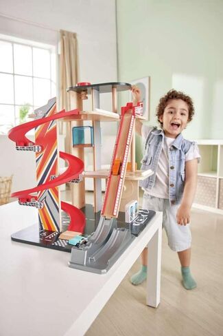 Hape Gearhead Stunt Garage Kids Wooden Toy Car Parking Garage Playset w/Elevator and 2 Exit Tracks, Detachable Loop, Includes 2 Wooden Toy Racecars in Saudi Arabia