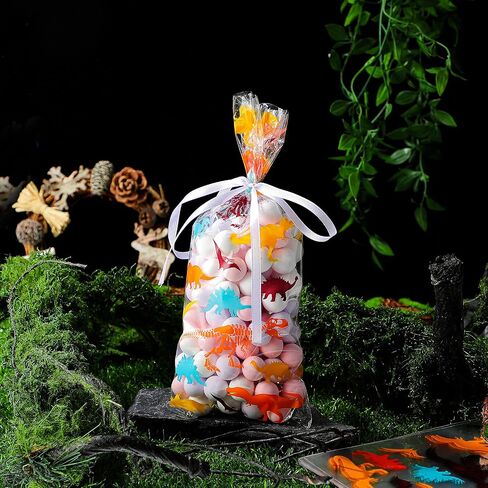 Outus 100 Pieces Dinosaur Cellophane Bags Clear Dinosaur Skeleton Bags Party Favors Bags with A Roll of Ribbon for Chocolate Candy Snacks Cookies Dinosaur Themed Party Supplies (Mixed Colors) in Saudi Arabia