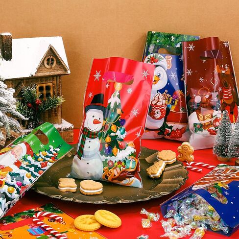 Hotop 150 Pieces Christmas Bags Snacks Xmas Plastic Party Favor with Handles Gift Wrap Goodie for Holiday Goody Decoration Supplies, 6 Styles in Saudi Arabia