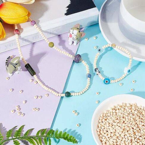 AHANDMAKER 1000pcs Wood Tude Beads, Undyed Natural Tiny Wooden Beads with 2mm Hole, 12x4mm Wood Beads for Crafts, Assorted Unfinished Wooden Loose Beads Spacer Beads for DIY Bracelet Jewelry Making in Kuwait