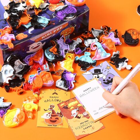63 قطعة من ألعاب BYTINO Pop Fidget Toys Pack Mini Pop Keychain Toys السائبة هدايا حفلات الهالوين للأطفال خدعة أو أكياس هدايا هدايا لعبة مكتب تخفيف التوتر (63 قطعة سلسلة مفاتيح + 63 قطعة بطاقة تهنئة) in Kuwait