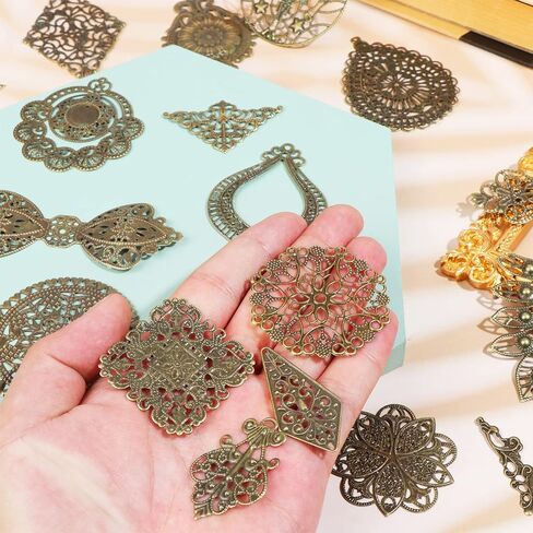 180 قطعة من دلايات الموصلات المخرمة من الحديد البرونزي العتيق، دلايات معدنية تبتية لصنع القلائد والمجوهرات بنفسك (30 نمط) in Kuwait