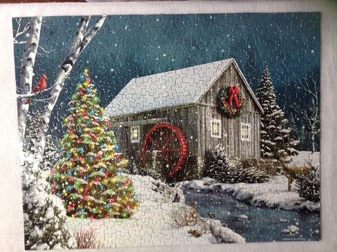 Springbok The Falling Snow 500 Piece Jigsaw Puzzle for Adults Features a Holiday Cabin Glowing in The Snow with a Decorated Christmas Tree Beside it in Saudi Arabia