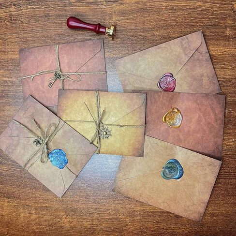 ورق ومظروف عتيق، مجموعة ورق قرطاسية للكتابة القديمة، تتضمن 24 ورقة عتيقة، و12 ظرفًا مع قلادة، و60 خرزة شمع مانعة للتسرب، وملعقة شمع، وختم ختم الشمع لكتابة الحروف in Kuwait