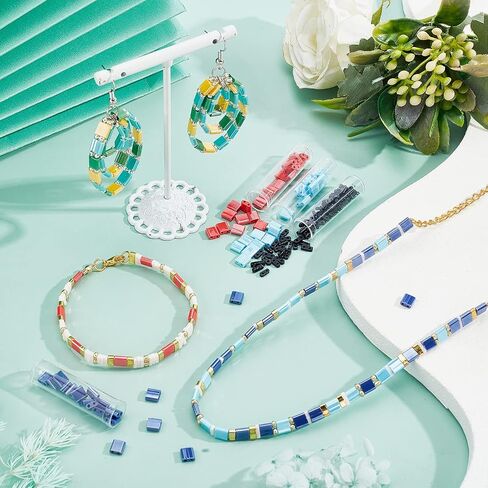 مجموعة خرز تيلا 790 قطعة 3 مقاسات من NBEADS، فاصل خرز زجاجي بفتحتين 10 ألوان مع 300 قطعة خرز بذور مستديرة 5 × 5 مم/5 × 2 مم/5 × 1 مم خرز زجاجي ياباني صغير لسوار وقلادة وأقراط صناعة المجوهرات in Saudi Arabia
