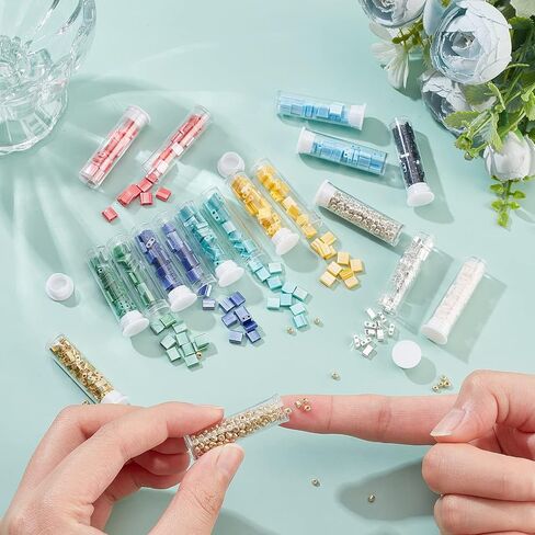 مجموعة خرز تيلا 790 قطعة 3 مقاسات من NBEADS، فاصل خرز زجاجي بفتحتين 10 ألوان مع 300 قطعة خرز بذور مستديرة 5 × 5 مم/5 × 2 مم/5 × 1 مم خرز زجاجي ياباني صغير لسوار وقلادة وأقراط صناعة المجوهرات in Saudi Arabia
