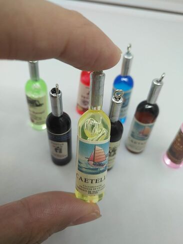 اموبيستر زجاجات نبيذ مصغرة ملونة لبيت الدمى، اكسسوارات مطبخ 8 قطع in Kuwait