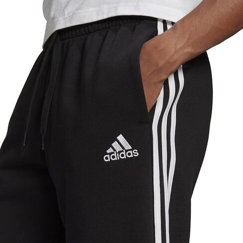 بنطال رجالي Adidas Essentials من الصوف ذو حاشية مفتوحة من ثلاثة خطوط in Kuwait