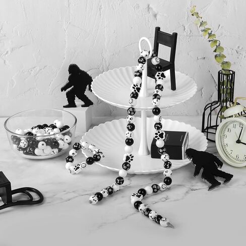 200 قطعة من الخرز الخشبي على شكل عظم مخالب الكلب من الخرز الخشبي باللونين الاسود والابيض، خرز فاصل لبصمات قدم الجراء، خرز فاصل خرز لصنع المجوهرات والعلكة لعيد الفصح والحرف اليدوية وديكور المنزل in Kuwait