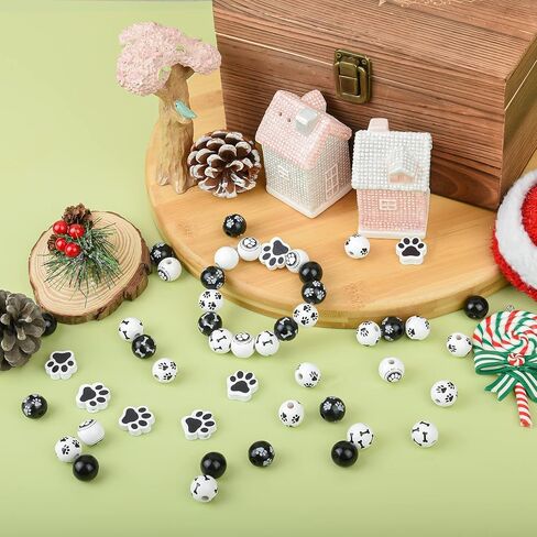 200 قطعة من الخرز الخشبي على شكل عظم مخالب الكلب من الخرز الخشبي باللونين الاسود والابيض، خرز فاصل لبصمات قدم الجراء، خرز فاصل خرز لصنع المجوهرات والعلكة لعيد الفصح والحرف اليدوية وديكور المنزل in Kuwait
