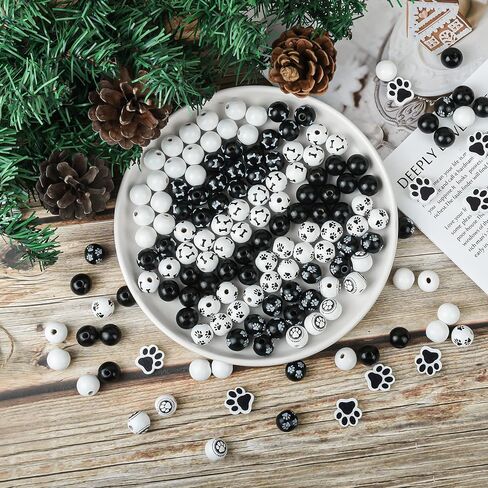 200 قطعة من الخرز الخشبي على شكل عظم مخالب الكلب من الخرز الخشبي باللونين الاسود والابيض، خرز فاصل لبصمات قدم الجراء، خرز فاصل خرز لصنع المجوهرات والعلكة لعيد الفصح والحرف اليدوية وديكور المنزل in Kuwait