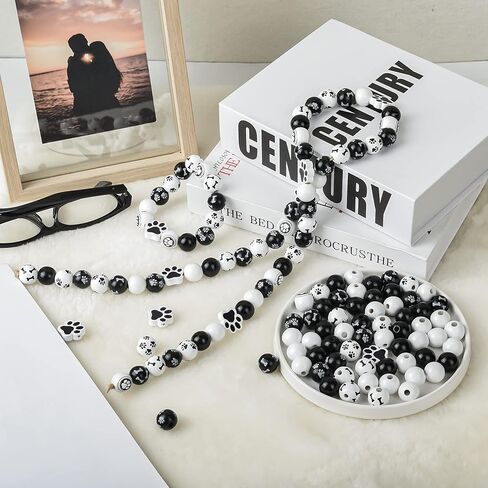 200 قطعة من الخرز الخشبي على شكل عظم مخالب الكلب من الخرز الخشبي باللونين الاسود والابيض، خرز فاصل لبصمات قدم الجراء، خرز فاصل خرز لصنع المجوهرات والعلكة لعيد الفصح والحرف اليدوية وديكور المنزل in Kuwait