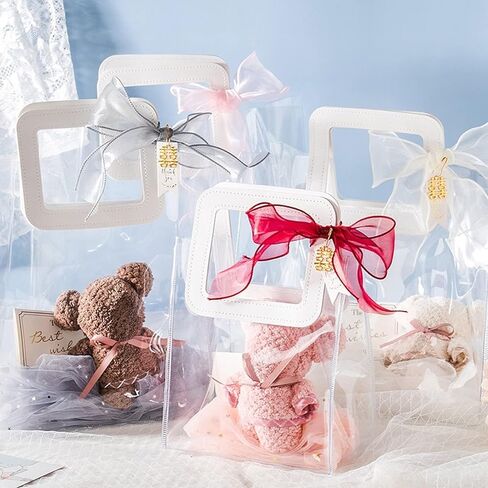 حقيبة هدايا شفافة بمقبض، 4 قطع حقيبة هدايا شفافة من البولي فينيل كلوريد، حقائب تغليف هدايا شديدة التحمل قابلة لإعادة الاستخدام لحفلات الزفاف، حفلات استقبال المولود الجديد، هدايا الزفاف، حقيبة تسوق كبيرة الحجم - 7 بوصة × 4 بوصة × 8 بوصة in Kuwait