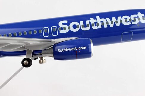 Daron 737-800 Skymarks Southwest Airplane Model with Gear & Wood Stand Heart (1/100 Scale), Blue in Saudi Arabia