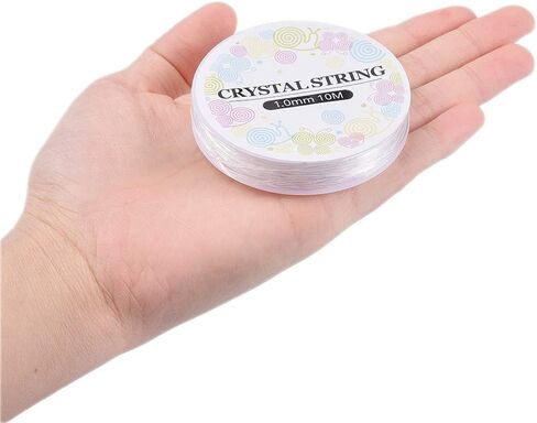Cheriswelry 10 لفات 0.5 مم سلك كريستال مرن شفاف أبيض قابل للتمدد سلسلة سوار شفاف مرن خرز خط اللمسات النهائية للخرز قلادة صناعة المجوهرات DIY Craft (18 متر/لفة) in Kuwait