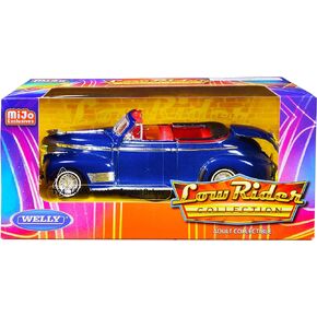1941 Chevrolet Special Deluxe Convertible Candy Blue Metallic with Red Interior Low Rider Collection 1/24 Diecast Model Car by Welly""" in Saudi Arabia