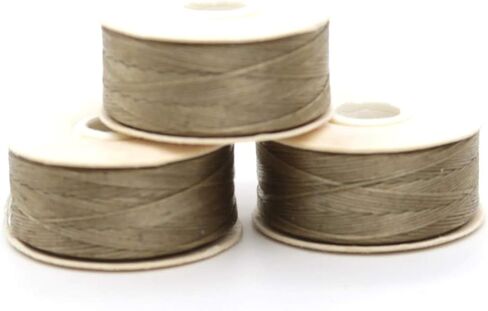 خيط خرز نايلون بطول 64 ياردة مقاس D لخرز ديليكا ورماد رملي، عبوة من 3 قطع من نايمو in Kuwait