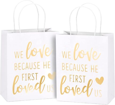 WRAPAHOLIC Medium Size Gift Bags - Gold Foil We Love Because He First Loved Us White Paper Bags with Handles for the Lovers of Scriptures and Christians - 12 Pack - 8" x 4" x 10" in Saudi Arabia