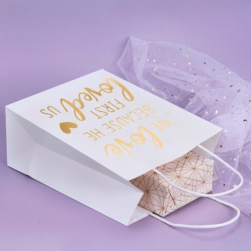 WRAPAHOLIC Medium Size Gift Bags - Gold Foil We Love Because He First Loved Us White Paper Bags with Handles for the Lovers of Scriptures and Christians - 12 Pack - 8" x 4" x 10" in Saudi Arabia