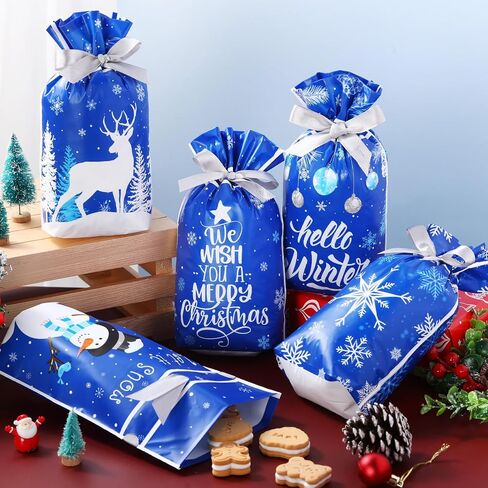 Pasimy 100 Pcs Christmas Gift Bags Christmas Plastic Treat Bags Winter Drawstring Goody Bags Xmas Plastic Goodies Bags Blue Snowflake Snowman Candy Bags for Xmas Party Favors Decorations Supplies in Saudi Arabia