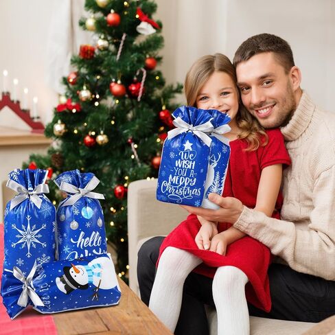 Pasimy 100 Pcs Christmas Gift Bags Christmas Plastic Treat Bags Winter Drawstring Goody Bags Xmas Plastic Goodies Bags Blue Snowflake Snowman Candy Bags for Xmas Party Favors Decorations Supplies in Saudi Arabia