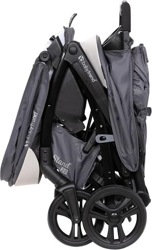 Baby Trend Sit N Stand Double Stroller 2.0 DLX with 5 Point Safety Harness, Canopy, Extra Basket, 2 Cup Holders, and Covered Compartment, Magnolia in Saudi Arabia