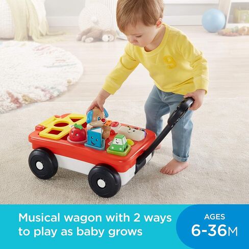 Fisher-Price Laugh & Learn Pull & Play Learning Wagon - German Edition, interactive toy wagon with shape blocks and learning content for baby and toddlers in Saudi Arabia
