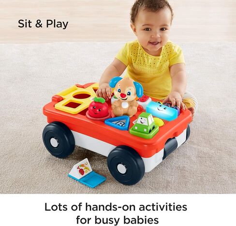 Fisher-Price Laugh & Learn Pull & Play Learning Wagon - German Edition, interactive toy wagon with shape blocks and learning content for baby and toddlers in Saudi Arabia