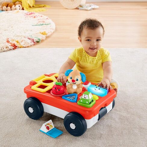 Fisher-Price Laugh & Learn Pull & Play Learning Wagon - German Edition, interactive toy wagon with shape blocks and learning content for baby and toddlers in Saudi Arabia