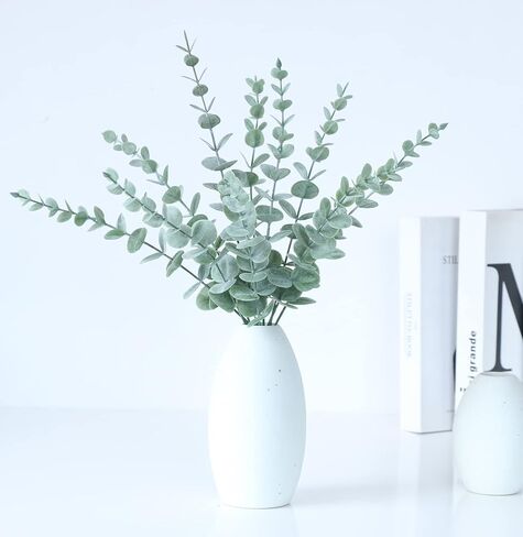أوراق سيقان الأوكالبتوس الاصطناعية من WEISPARK - 25 قطعة من أوراق الأوكالبتوس المزيفة ذات اللمس الحقيقي وأغصان نبات الأوكالبتوس الصناعي لمزهرية DIY باقة مركزية لديكور المنزل والزفاف (بدون مزهرية) (25 قطعة) in Kuwait