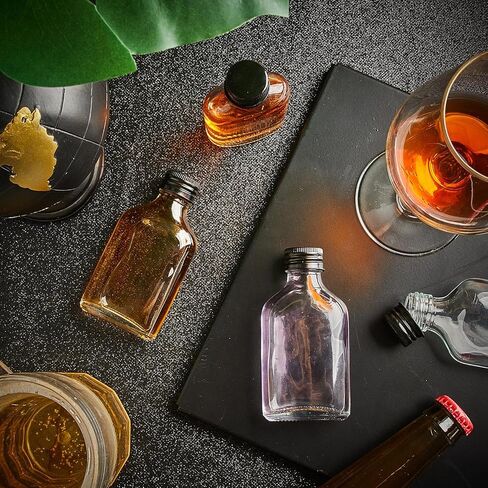 Patelai Mini Liquor Bottles Reusable Glass Flask Bottles with Black Caps Clear Empty Alcohol Shot Bottles Small Champagne Bottles DIY Gift for Valentine Birthday Weddings Party Favors(50 ml, 32 Pcs) in Saudi Arabia
