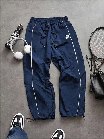 OYOANGLE Men's Graphic Workout Pants Drawstring Waist Fitness Trousers Loose Fit Gym Running Breathable Sweatpants in Saudi Arabia