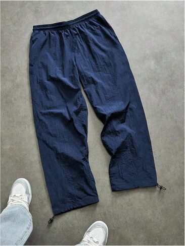OYOANGLE Men's Graphic Workout Pants Drawstring Waist Fitness Trousers Loose Fit Gym Running Breathable Sweatpants in Saudi Arabia