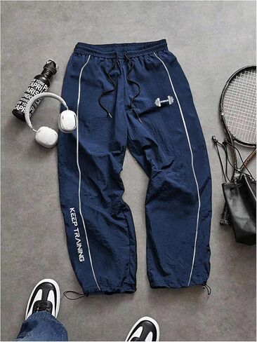 OYOANGLE Men's Graphic Workout Pants Drawstring Waist Fitness Trousers Loose Fit Gym Running Breathable Sweatpants in Saudi Arabia