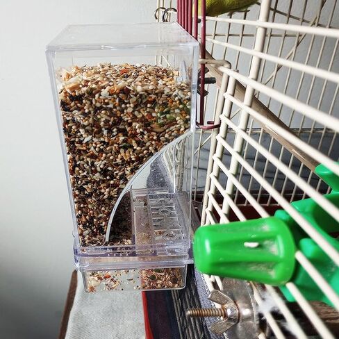 Automatic Bird Seed Feeder with Perch, Acrylic Transparent Parrot Foraging Feeders Cage Accessories for Small and Medium Parrots Parakeets Cockatiels Lovebirds in Saudi Arabia