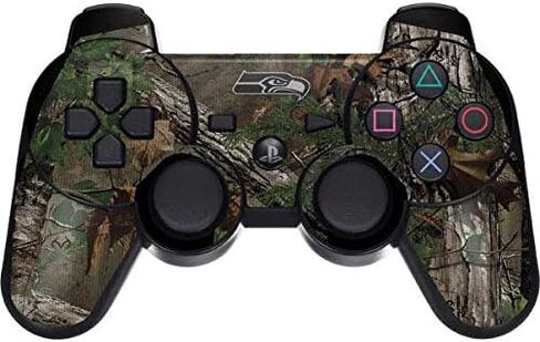 Skinit Decal Gaming Skin Compatible with PS3 Dual Shock Wireless Controller - Officially Licensed NFL Seattle Seahawks Realtree Xtra Green Camo Design in Saudi Arabia
