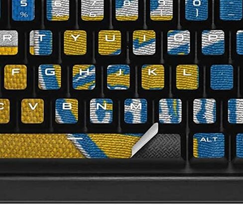 غلاف Skinit متوافق مع لوحة مفاتيح الألعاب الميكانيكية البلاتينية K95 RGB - تصميم عتيق مرخص رسميًا من NFL Los Angeles Chargers in Saudi Arabia