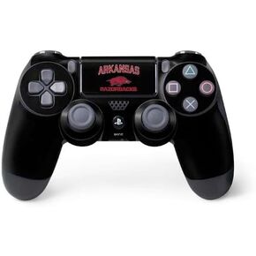 ملصق Skinit المخصص للألعاب متوافق مع وحدة تحكم PS4 - تصميم أسود مرخص رسميًا من جامعة أركنساس-فايتفيل in Kuwait