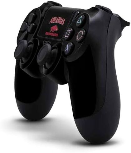 ملصق Skinit المخصص للألعاب متوافق مع وحدة تحكم PS4 - تصميم أسود مرخص رسميًا من جامعة أركنساس-فايتفيل in Kuwait