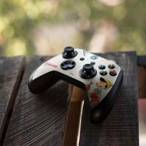 غلاف Skinit المخصص للألعاب متوافق مع وحدة تحكم Xbox One S - تصميم صورة مرخص رسميًا من Disney Pinocchio Vintage in Saudi Arabia