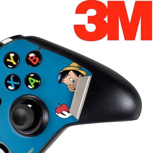 ملصق Skinit المخصص للألعاب متوافق مع وحدة تحكم Xbox One - تصميم مرخص رسميًا من Disney Pinocchio بدون شروط in Saudi Arabia