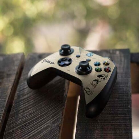 ملصق Skinit المخصص للألعاب متوافق مع وحدة تحكم Xbox One S - تصميم بورتريه لرسومات Disney Pinocchio المرخصة رسميًا in Saudi Arabia