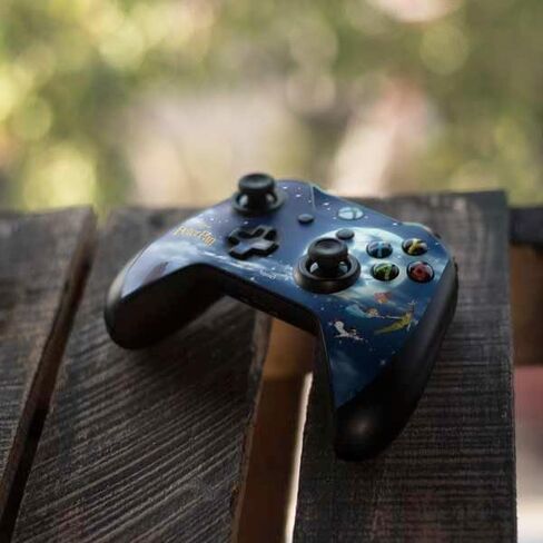 ملصق Skinit المخصص للألعاب متوافق مع وحدة تحكم Xbox One S - مرخص رسميًا من Disney Peter Pan Wendy and The Boys to Neverland Design in Saudi Arabia