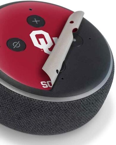 غلاف صوتي من Skinit متوافق مع Amazon Echo Dot 3 - تصميم أحمر مرخص رسميًا من جامعة أوكلاهوما in Saudi Arabia