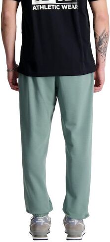 New Balance Men's NB Essentials Stacked Logo Sweatpant in Saudi Arabia