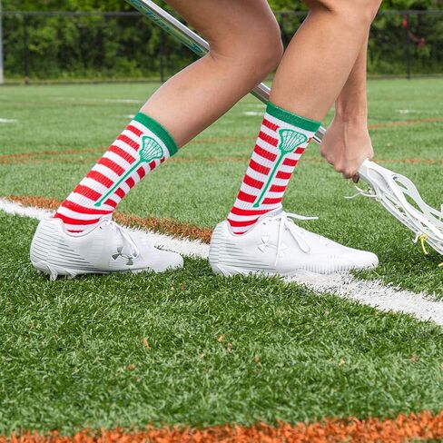 ChalkTalkSPORTS Athletic Half Cushioned Lacrosse Crew Socks | Mid Calf | Christmas Lax Stripes | Red & White in Saudi Arabia