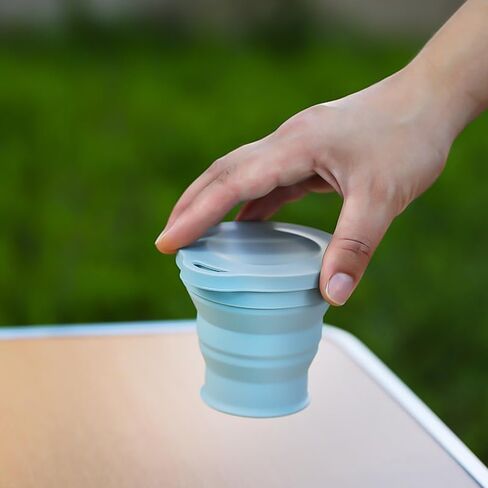 Folding water cup can be carried, drinking water cup outdoor camping compression cup retractable silicone cup (Pink) in Saudi Arabia