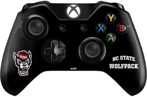 ملصق Skinit المخصص للألعاب متوافق مع وحدة تحكم Xbox One - تصميم Wolfpack مرخص رسميًا من جامعة ولاية كارولينا الشمالية in Saudi Arabia